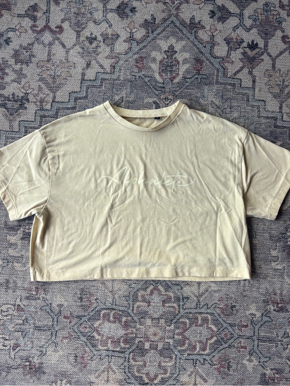 Alphalete Cropped Tee in Pale Yellow